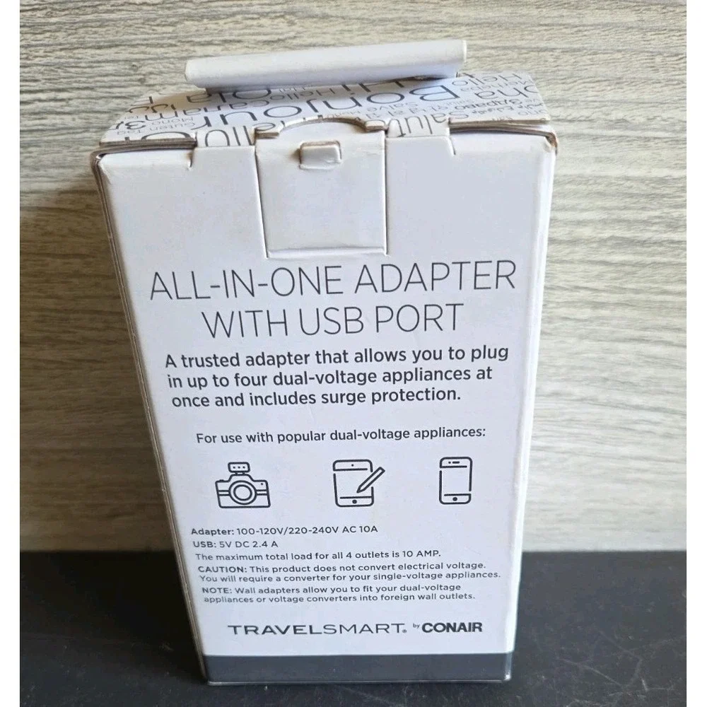 Travel Smart by Conair All-in-One Adapter with USB Port. E6